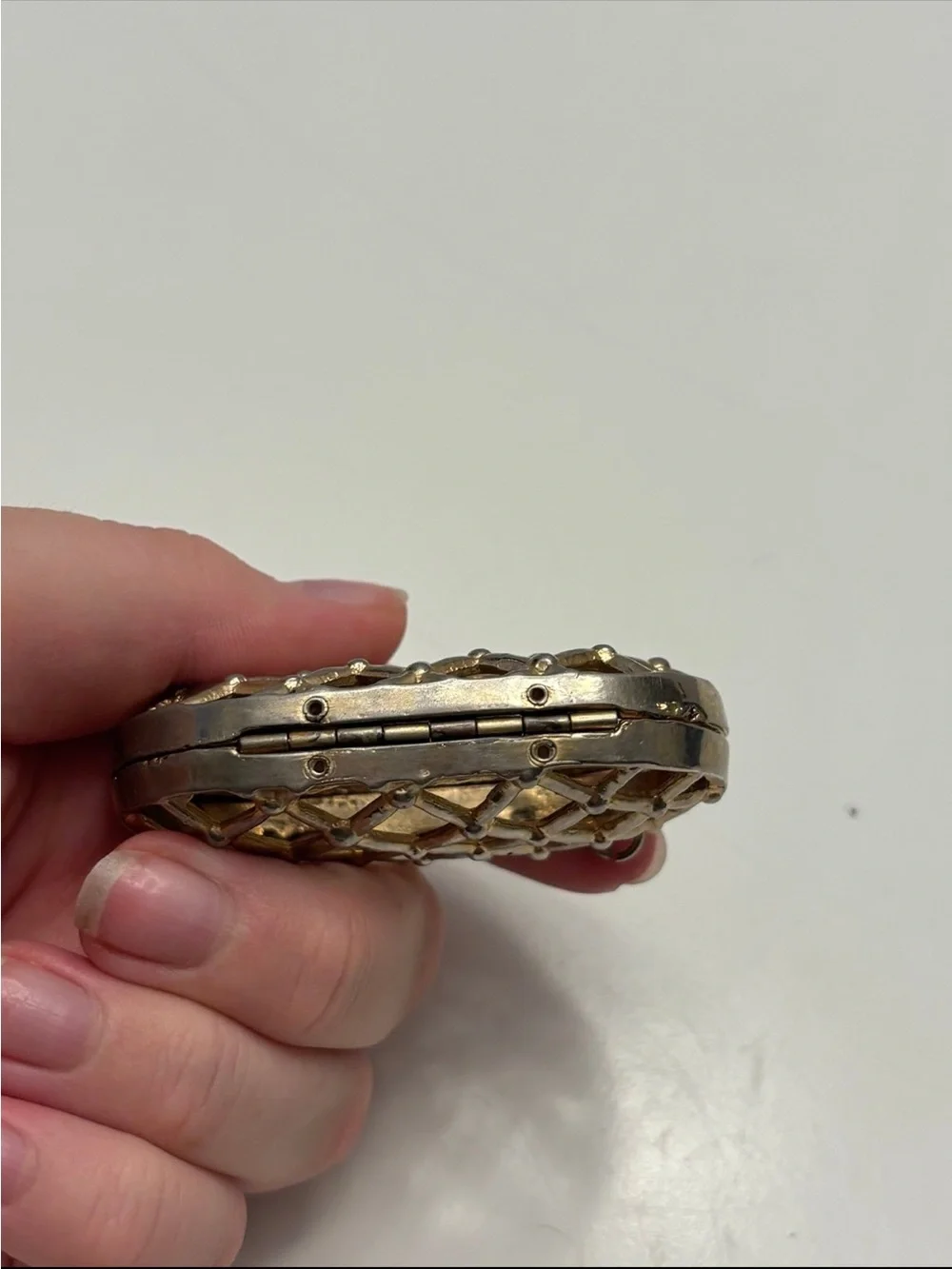 vintage metal cage or lattice-design mini coin clutch